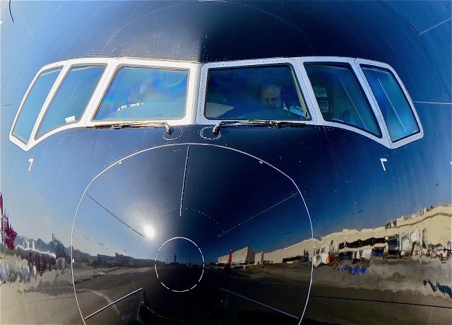 BOEING 777-300ER (ZK-OKQ) - LAX Tower and Theme Building visible in the nose cone