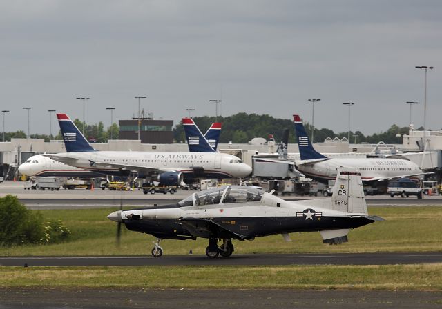 N98545 — - This US Air Force T-6A Texan II turboprop trainer was using taxiway Alpha, Charlotte, North Carolina, Sunday afternoon, 2 May 2013