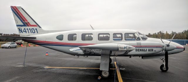 Piper Navajo (N41101) - Birchwood Airport AK tie-down yard.