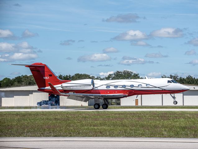 Gulfstream Aerospace Gulfstream IV (N15Y) - RED GIV touching down at KVRB