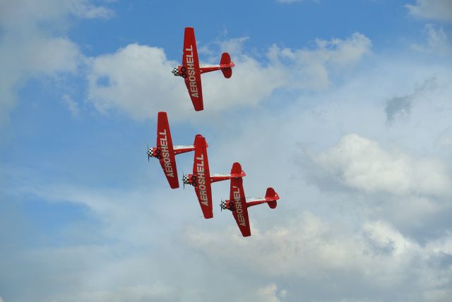 North American T-6 Texan — - The Aeroshell aerobatic team preforming at Oshkosh Air Venture 2015