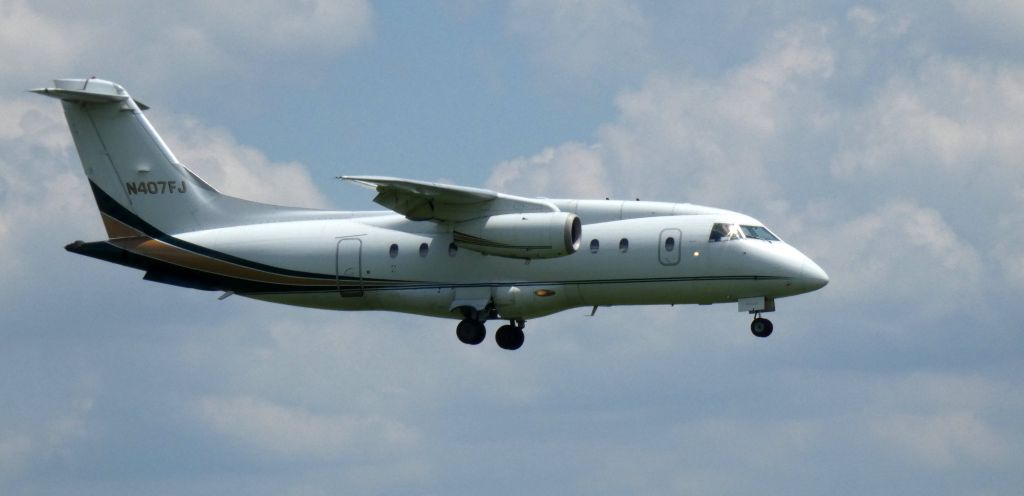 Fairchild Dornier 328JET (N407FJ) - On final is this 2000 Fairchild Dornier 328-300 Jet in the Summer of 2021.