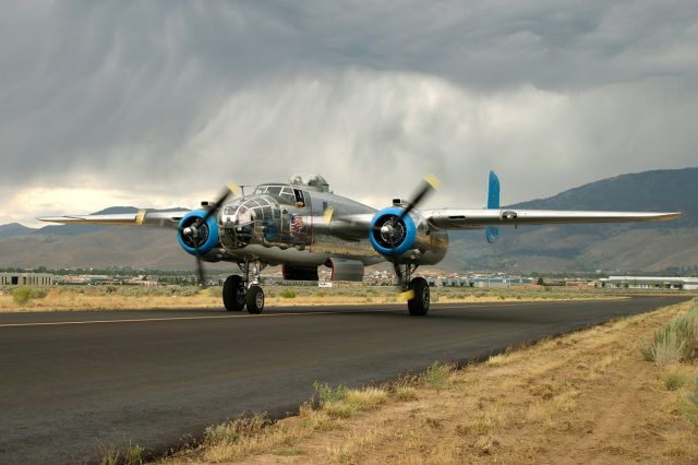 N7946C — - The North American B-25J Mitchell bomber Old Glory taxis in under ominous skies @ Carson City airport.