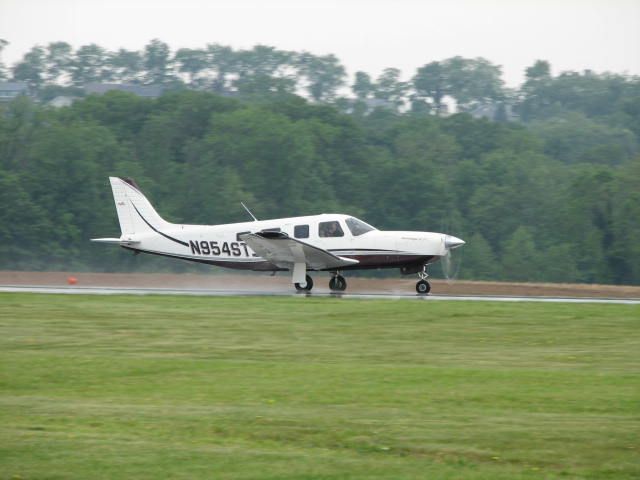 Piper Saratoga (N954ST) - Taking off on a wet runway at Selinsgrove.