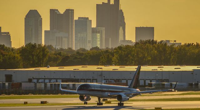 Boeing 757-200 (N757AF) - Trumps 757 rotating off of 10R at CMH with downtown Columbus in the background.