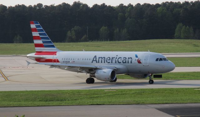 Airbus A319 (N748UW) - Baby bus turning onto taxiway F on the way to CLT.