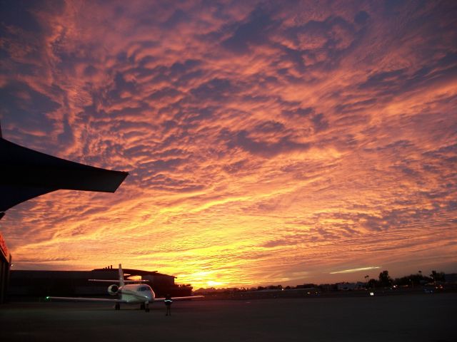 Cessna Citation Sovereign — - A NetJets Citation Sovereign ready to depart the Scottsdale Air Center with the Arizona sunset in the background