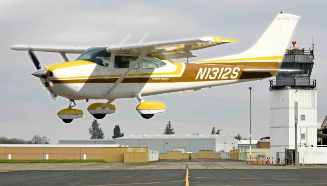 Cessna Skylane (N1312S) - Upwind Runway Three-Zero at the Merced-Yosemite Regional Airport.