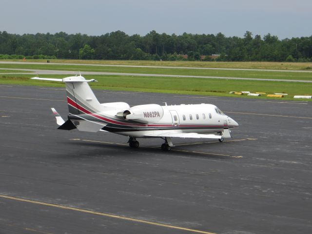 Learjet 60 (ELJ862) - Just landed before a storm hit at Richmond Executive (FCI)