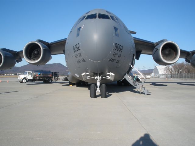 — — - A good shot of the size of this big big airplane from the nose view.