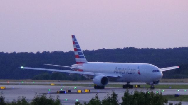 Boeing 777-200 (N755AN) - American 174 departing to London LHR at 8:42 P.M.  Taken June 7, 2015.  