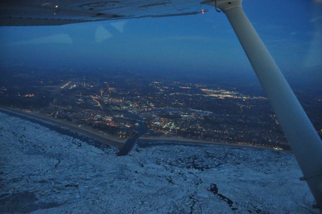 Cessna Cutlass RG (N9421D) - % miles or so from Benton Harbor looking back toward the airport from over the ice covered lake. 