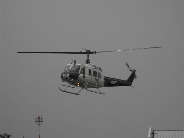 Bell UH-1V Iroquois (N120FC) - Florida Forestry 20 trying to beat the rain to Tallahassee on another rainy day.