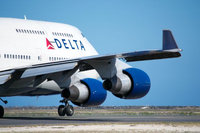 Boeing 747-400 — - Delta Boeing 747-400 showing off its wing at PHNL.