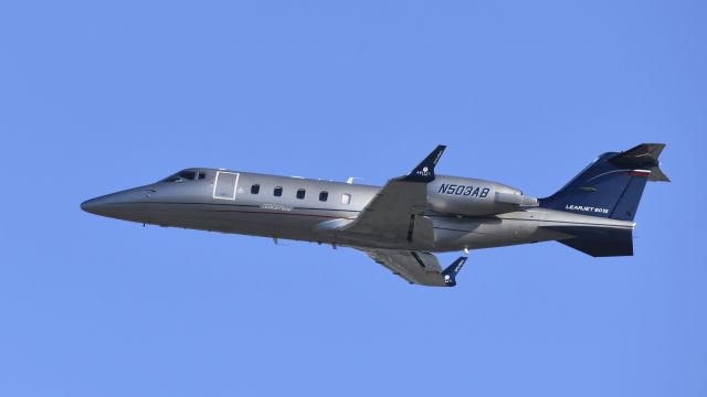 Learjet 60 (N503AB) - Departing LAX on 25L