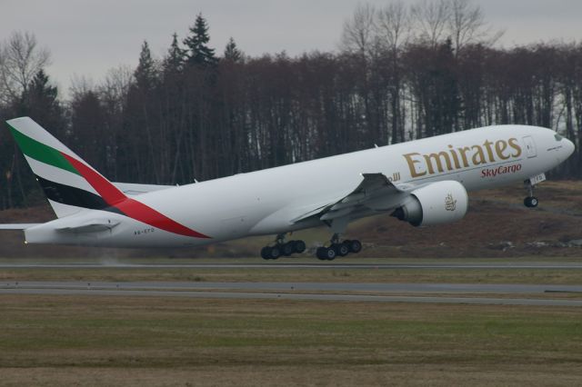 A6-EFD — - First 777F for Emirates Sky Cargo seen lifting off on its delivery flight.