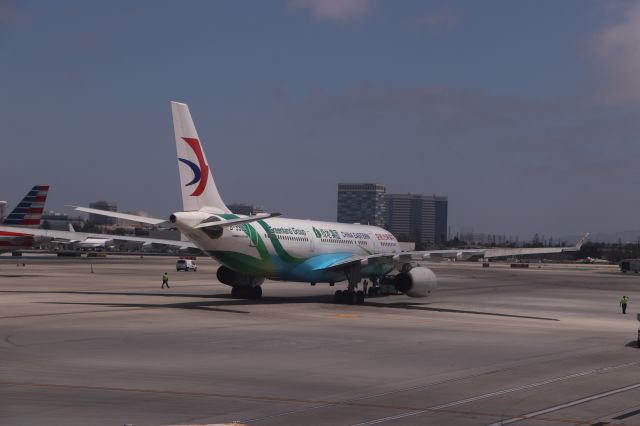 Airbus A330-200 (B-5902) - 6/19/18 after pushback, getting ready to release the tug