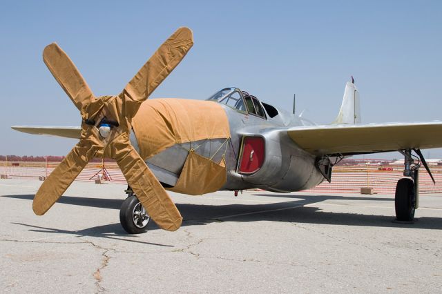 — — - The Planes of Fame air museum is a great place to see rare aircraft. Here is a Bell P-59 Airacomet that the museum is lovingly restoring to airworthy shape. The first operational jet fighter in the U.S. inventory, it was underpowered and didnt make it into combat in WWII. Shown here with a fake propeller used to confuse any enemy agents seeing the aircraft before its first flight.