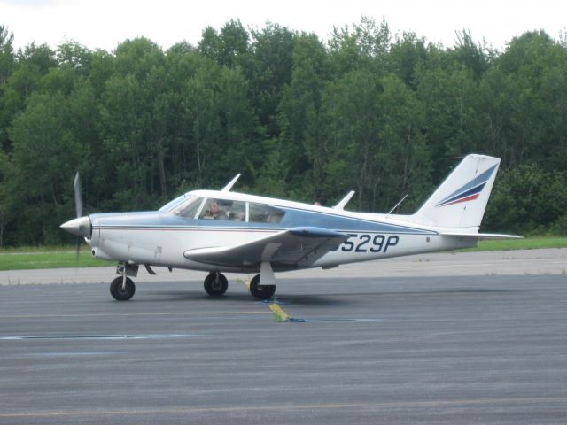 Piper PA-24 Comanche (N6529P) - Parking on the ramp.