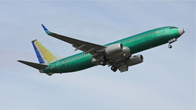 Boeing 737-800 (N1787B) - BOE444 (LN:3996) flies a missed approach over runway 16R during its maiden flight on 3/27/12. This plane is a 737-8U3(WL) for Garuda Indonesia and will carry registration #PK-GMX.