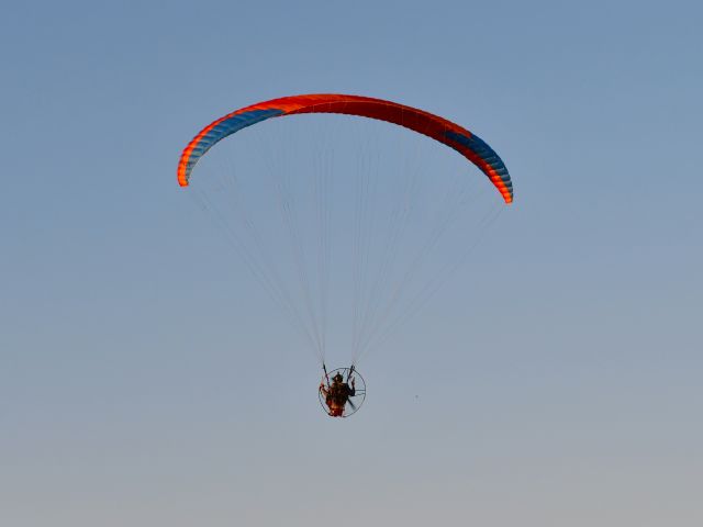 — — - Powered paragliding flying on Brighton, Michigan