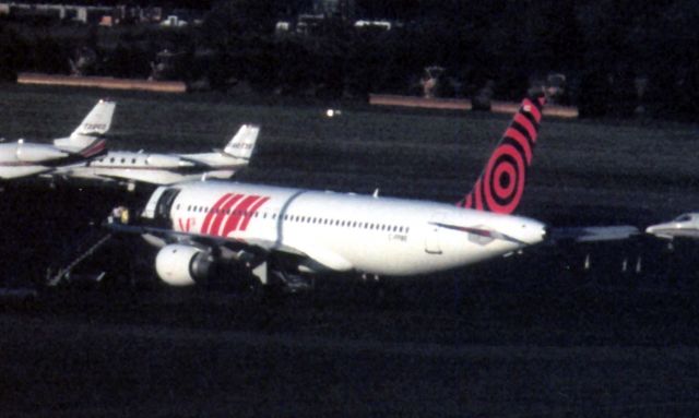 Airbus A320 (C-FPWE) - Air Canada Jetz A320 (C-FPWE) in U2s Vertigo Tour colors in 2005 with V1 titles. Photo dated 10/03/05.