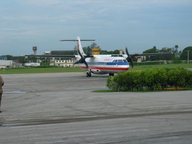 — — - Return flight from MUHA to KMIA taxiing in.