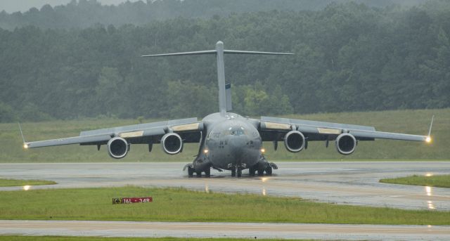 Boeing Globemaster III (03-3114) - BLUES21 Heavy arriving in a noticeable rain shower!