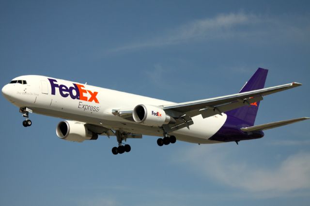 BOEING 767-300 (N104FE) - Arrival 30L, from KMEM, 07-17-2014
