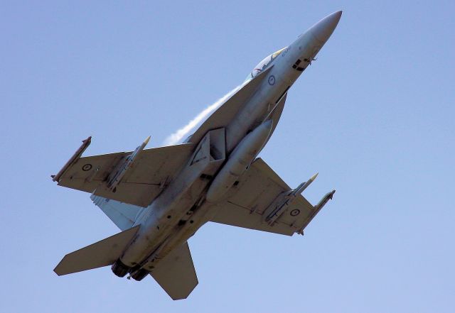 McDonnell Douglas FA-18 Hornet (A44202) - Display by RAAF FA18F at TAVAS air show 21 April 2017 Caboolture Queensland. Overcast day and hi G turns give some good effects US number 167958 visible under tail