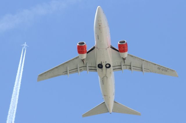 Boeing 737-700 (SE-DTH) - Departing runway 09R at LHR.