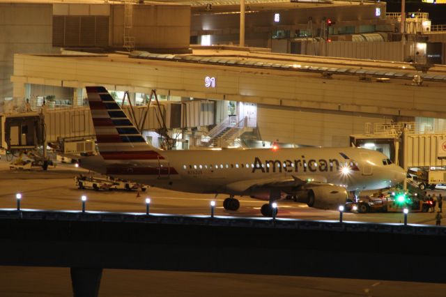 Airbus A319 (N762US) - American A319 about to be tugged to overnight parking at MCO.