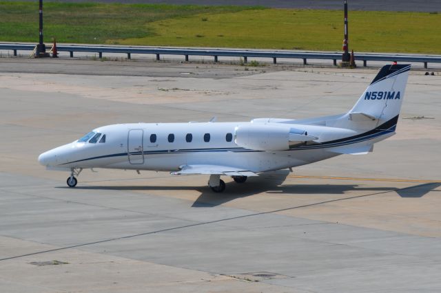 Cessna Citation Excel/XLS (N591MA) - HILLAIR HOLDINGS LLC (Malone Air Charter) taxiing to FBO at KATL - 6/12/16