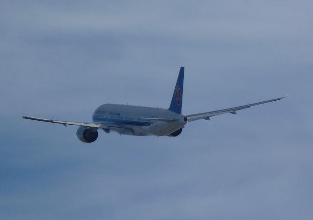 BOEING 777-300 — - Out of the paint hanger and headed to Paine Field.