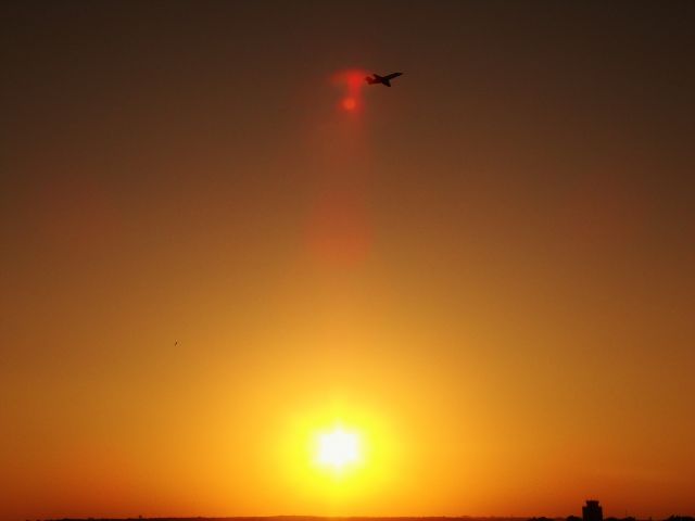 Cessna Citation Excel/XLS — - Sunset takeoff out of Des Moines! no color edit with this photo! Des Moines sunset is beautiful.