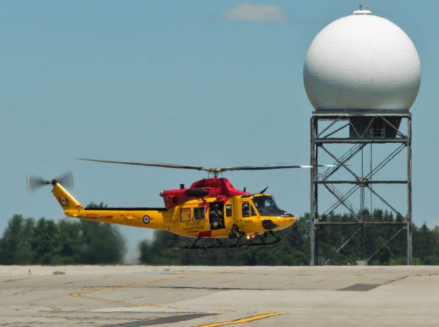 Bell 412 (14-6432) - Arriving on a hot tarmac.