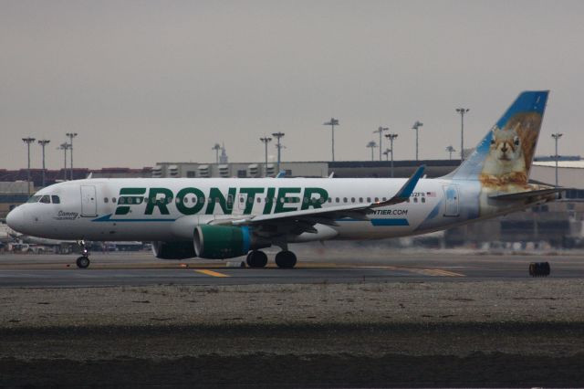 Airbus A320 (N232FR) - Sammy Squirrel departing BOS on New Year's Eve. 