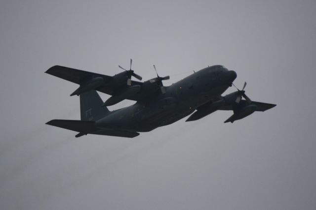 Lockheed C-130 Hercules (6414863) - USAF C-130 (64-14863) from Pope Air Force Base perfoms a touch and go at Sarasota-Bradenton International Airport