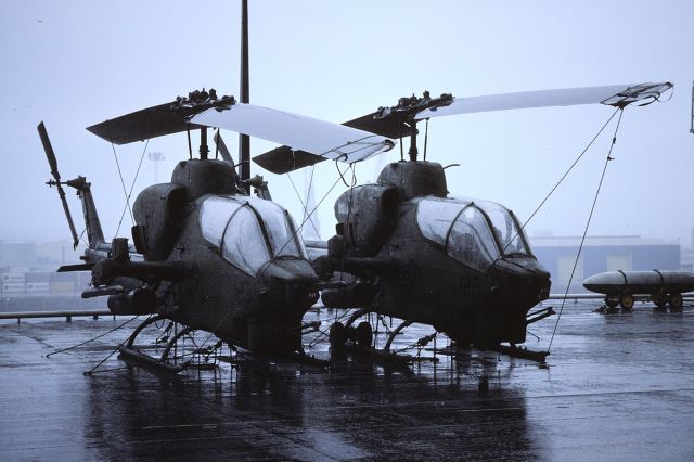 — — - In miserable weather on board USS Tarawa in Fremantle Harbour, Western Australia