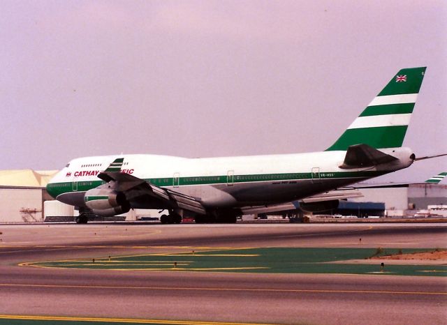 Boeing 747-400 (VR-HOO) - KLAX- Sept 1989 saw VR-Hoo landing 25 L and position for the hold bars of 25 R. This jet one of the 1st 747 400 series for Cathay. This jet was re-reg after 1997.