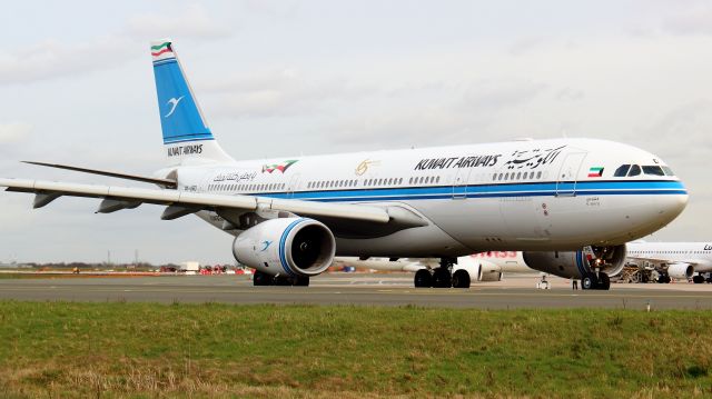 Airbus A330-200 (9K-APD) - View from Terminal 1. Sticker "65 years of planeering"21/02/2020