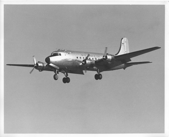 — — - This is from my 1972-74 archives.  I photographed this Air America C-54 landing at Yokota Air Base (near Tokyo, Japan) in 1973. 