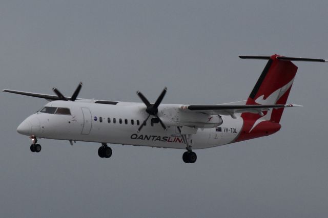 de Havilland Dash 8-300 (VH-TQL) - On short finals to runway 05. landing as QF2145 from Kingscote.