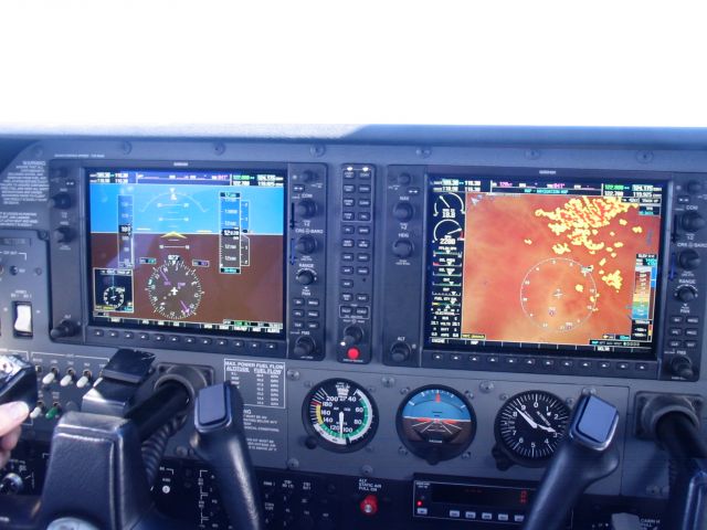 Cessna Skylane (N2700A) - Passing over North Fork Valley Airport on a tour of the Colorado mountains.