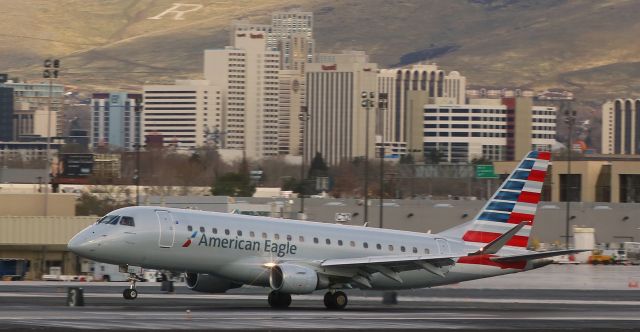 Embraer 170/175 (N207AN) - This Compass Airlines E175 (N207AN) is snapped as it lands on 16R to complete a flight from LAX.