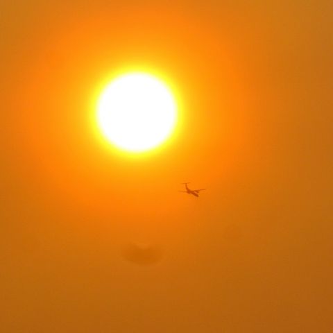 de Havilland Dash 8-400 (C-GGMN) - Taken an hour and a half after sunrise. We have a hazy, smoky morning sky from BC interior wildfires