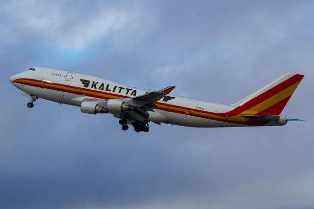 Boeing 747-400 (N709CK) - A slight rainbow over the nose