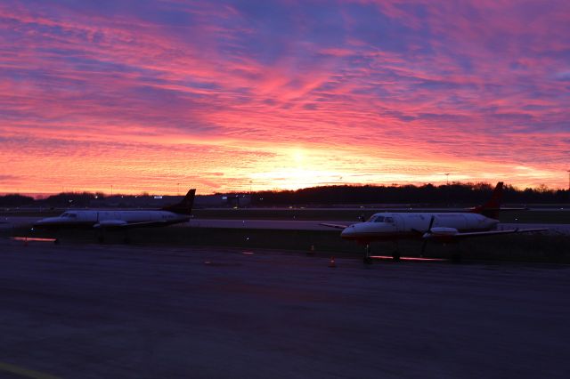 Fairchild Dornier SA-227DC Metro (XA-USJ) - An amazing sunrise this morning behind XA-USJ and XA-VCZ on the ramp at KTOL, 27 Nov 2021.