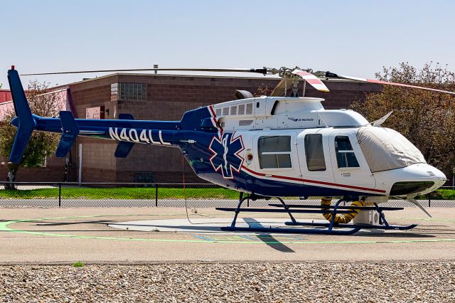 Bell 407 (N404LL) - On the pad at Frederick-Firestone Fire Protection District (CO) station #2. 17 July, 2018