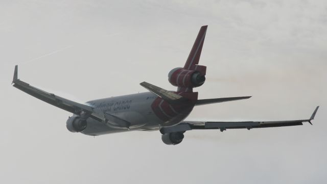 Boeing MD-11 — - Martinair MD-11 departing from KMIAs runway 27. With wing condensation and wingtip trails too! :D